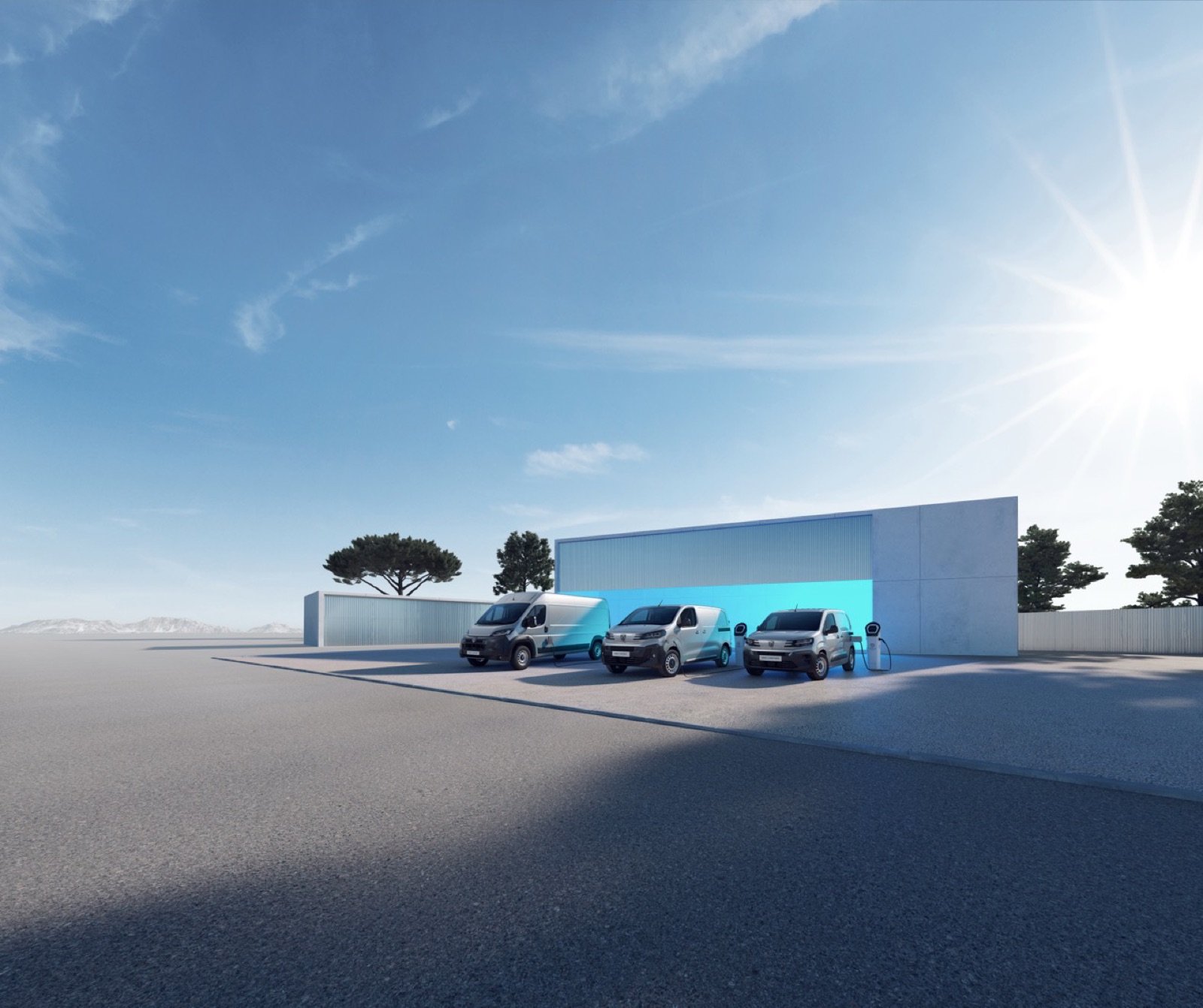 Flotte d'utilitaires électriques Peugeot en recharge — réseau de franchise turtle.camp